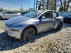2026 Tesla Model Y Gray vin: 7SAYGDEE2TF602126