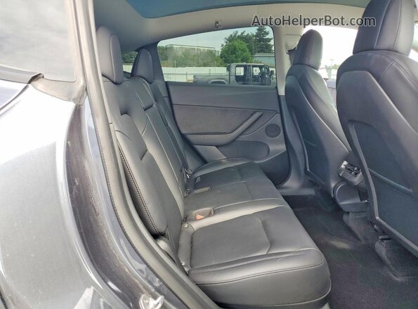 7SAYGDEE3NF402469 2022 TESLA MODEL Gray Vista de los asientos traseros