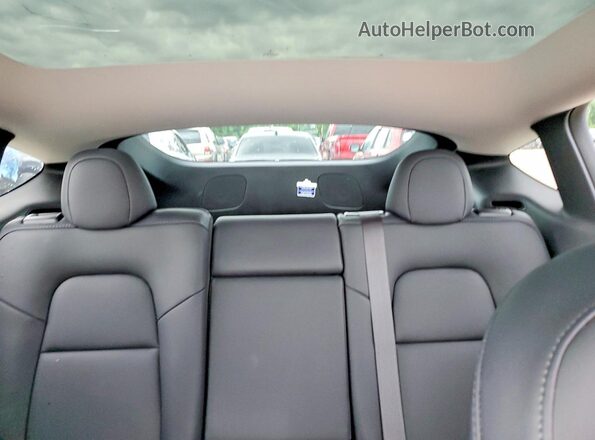 7SAYGDEE3PA149167 2023 TESLA MODEL White Rear seats view