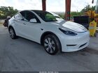 2023 Tesla Model Y Awd/long Range Dual Motor All-wheel Drive White vin: 7SAYGDEE3PA177907
