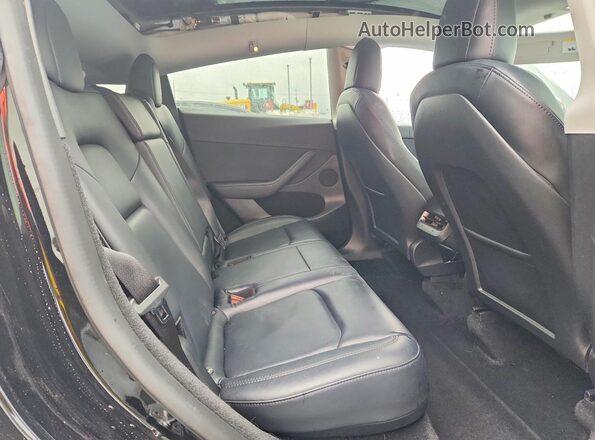 7SAYGDEE3PF589568 2023 TESLA MODEL Black Rear interior view