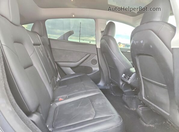 7SAYGDEE3PF905034 2023 TESLA MODEL Gray Rear seats view