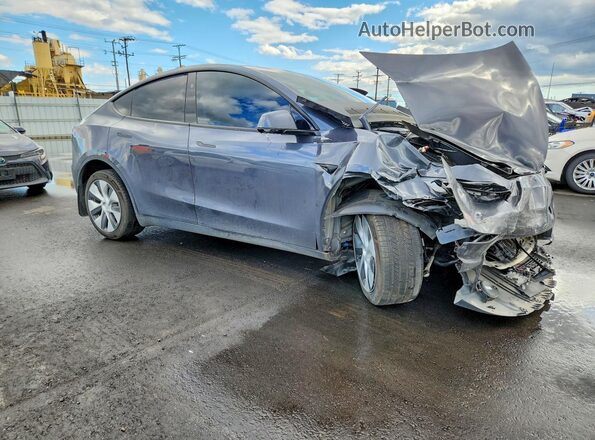 7SAYGDEE3PF905034 2023 TESLA MODEL Gray Front right