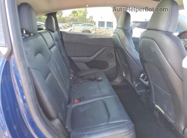 7SAYGDEE3RA230687 2024 TESLA MODEL Blue Սալոնի հետևի տեսք