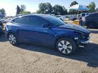 2024 Tesla Model Y Blue vin: 7SAYGDEE3RA230687