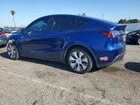 2024 Tesla Model Y Blue vin: 7SAYGDEE3RA230687