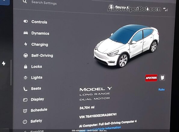 7SAYGDEE3RA289741 2024 TESLA MODEL Y Red Widok tylnych siedzeń