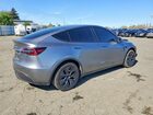 2024 Tesla Model Y Silver vin: 7SAYGDEE3RA295605