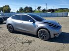 2024 Tesla Model Y Silver vin: 7SAYGDEE3RA295605