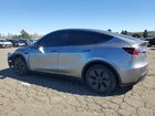 2024 Tesla Model Y Silver vin: 7SAYGDEE3RA295605