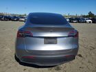 2024 Tesla Model Y Silver vin: 7SAYGDEE3RA295605