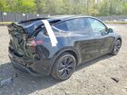 2024 Tesla Model Y Black vin: 7SAYGDEE3RA317800