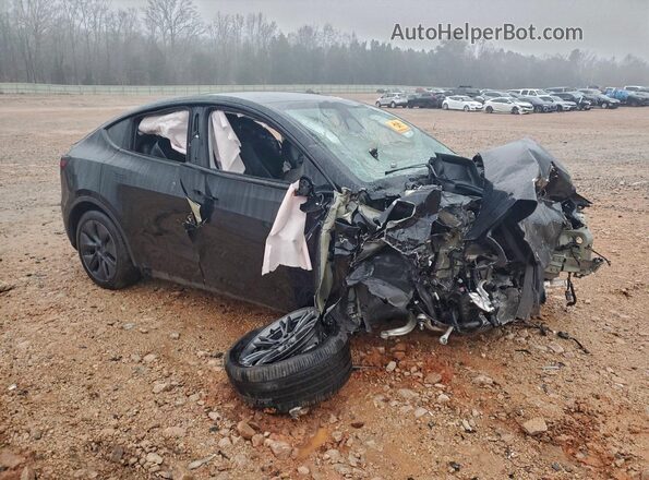 7SAYGDEE3RA318297 2024 TESLA MODEL Черный Передняя правая четверть