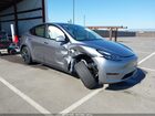 2024 Tesla Model Y Long Range Dual Motor All-wheel Drive Серый vin: 7SAYGDEE3RA325024