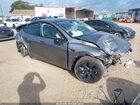 2024 Tesla Model Y Long Range Dual Motor All-wheel Drive Gray vin: 7SAYGDEE3RA327081