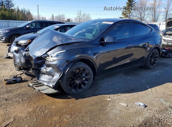 7SAYGDEE3RF027141 2024 TESLA MODEL Gray Front left