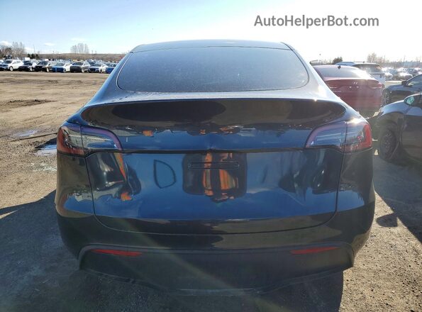 7SAYGDEE3RF027141 2024 TESLA MODEL Gray Rear view