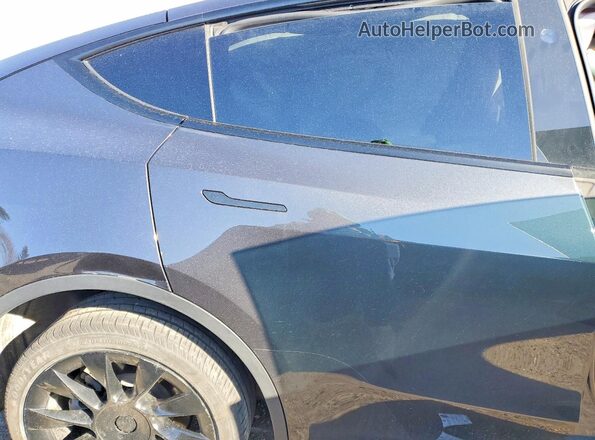 7SAYGDEE3RF027141 2024 TESLA MODEL Gray Rear seats view