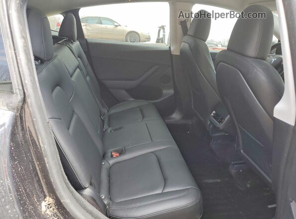 7SAYGDEE3RF030802 2024 TESLA MODEL Gray Vista de los asientos traseros