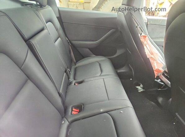 7SAYGDEE3RF109676 2024 TESLA MODEL White Rear seats view