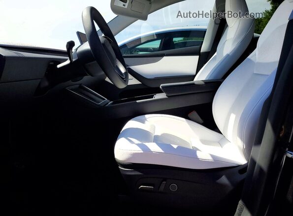 7SAYGDEE3TF355621 2026 TESLA MODEL Charcoal Вид салону спереду