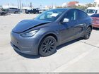 2023 Tesla Model Y Awd/long Range Dual Motor All-wheel Drive Gray vin: 7SAYGDEE4PA025358