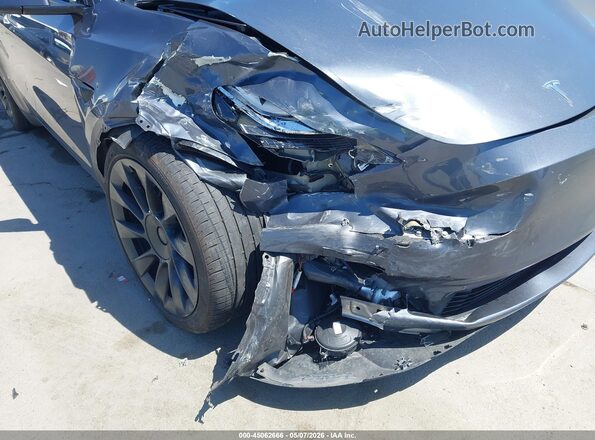 7SAYGDEE4PA025358 2023 TESLA MODEL Y Gray Front view