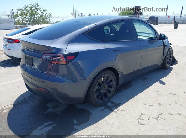 7SAYGDEE4PA025358 2023 TESLA MODEL Y Gray Rear right