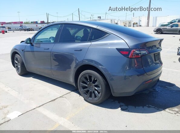 7SAYGDEE4PA025358 2023 TESLA MODEL Y Gray Rear left