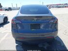 2023 Tesla Model Y Awd/long Range Dual Motor All-wheel Drive Gray vin: 7SAYGDEE4PA025358