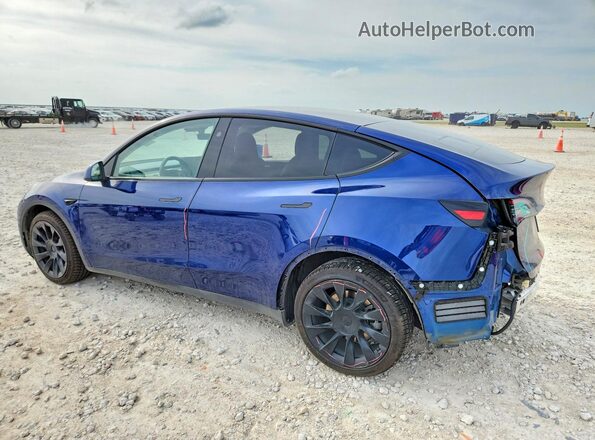 7SAYGDEE4PA186597 2023 TESLA MODEL Blue Trasero izquierdo
