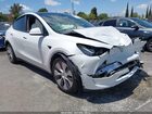 2023 Tesla Model Y Awd/long Range Dual Motor All-wheel Drive White vin: 7SAYGDEE4PF630113