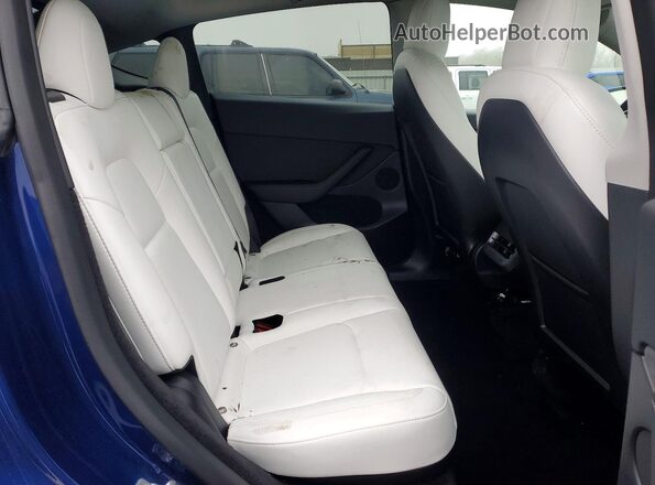 7SAYGDEE4PF667355 2023 TESLA MODEL Blue Вид задньої частини салону