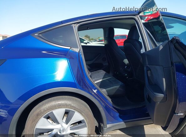 7SAYGDEE4PF910954 2023 TESLA MODEL Y Blue Widok naklejki z numerem VIN