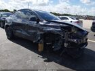 2024 Tesla Model Y Long Range Dual Motor All-wheel Drive Gray vin: 7SAYGDEE4RA302562