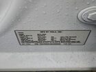 2025 Tesla Model Y White vin: 7SAYGDEE4SA355042