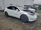 2025 Tesla Model Y White vin: 7SAYGDEE4SA355042