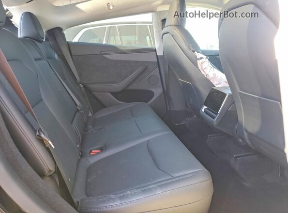 7SAYGDEE4TF564513 2026 TESLA MODEL Black Rear interior view