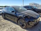 2026 Tesla Model Y Black vin: 7SAYGDEE4TF564513