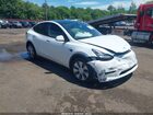 2023 Tesla Model Y Awd/long Range Dual Motor All-wheel Drive Белый vin: 7SAYGDEE5PA055730