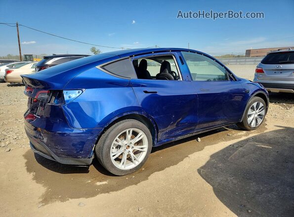 7SAYGDEE5PA106305 2023 TESLA MODEL Blue Trasero derecho