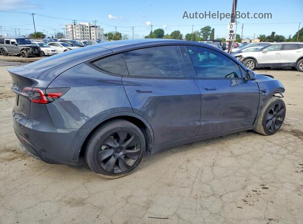 7SAYGDEE5PF945924 2023 TESLA MODEL Gray Trasero derecho