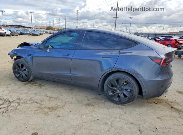 7SAYGDEE5PF945924 2023 TESLA MODEL Gray Trasero izquierdo