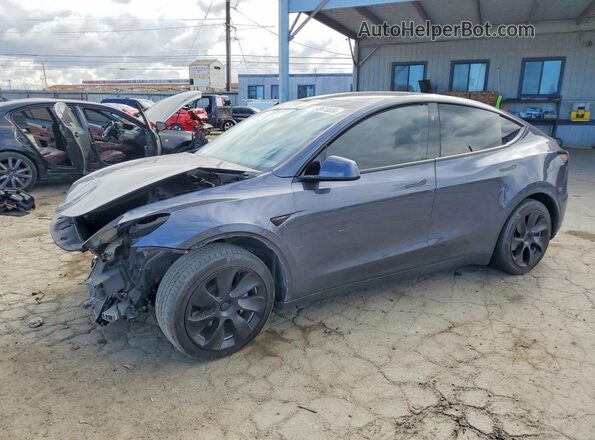 7SAYGDEE5PF945924 2023 TESLA MODEL Gray Vista tres cuartos delantera izquierda