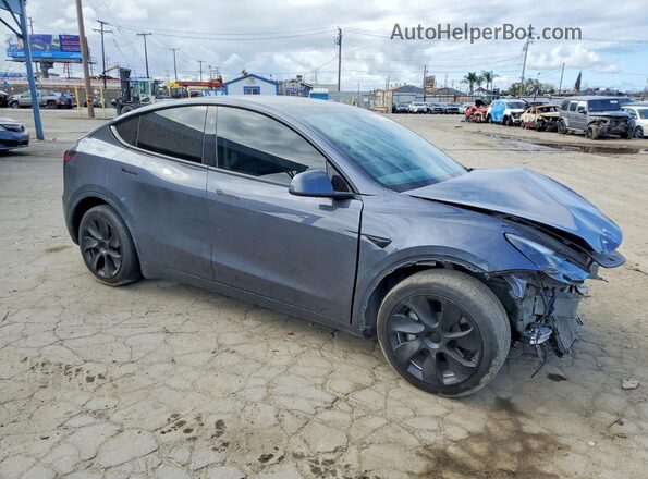 7SAYGDEE5PF945924 2023 TESLA MODEL Gray Delantero derecho