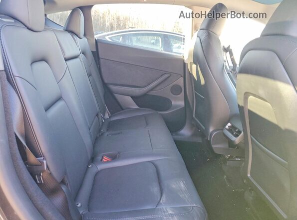 7SAYGDEE5RF989313 2024 TESLA MODEL Black Rear seats view