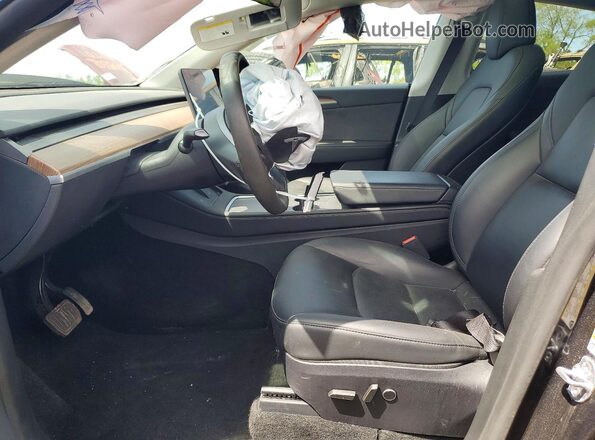 7SAYGDEE5SF256460 2025 TESLA MODEL Charcoal Front interior view