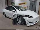 2023 Tesla Model Y Awd/long Range Dual Motor All-wheel Drive White vin: 7SAYGDEE6PF675621