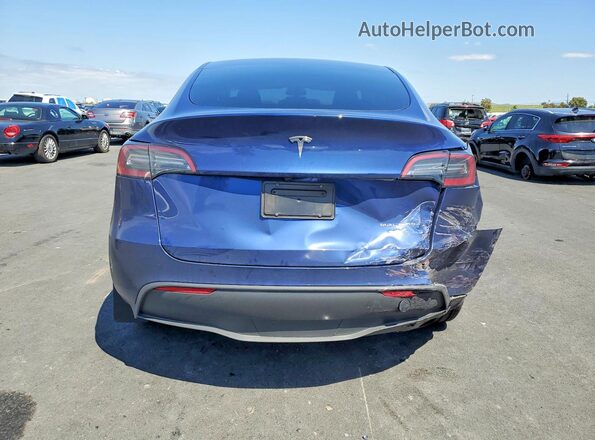 7SAYGDEE6PF836484 2023 TESLA MODEL Blue Rear view