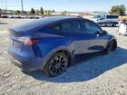 2024 Tesla Model Y Blue vin: 7SAYGDEE6RF005151